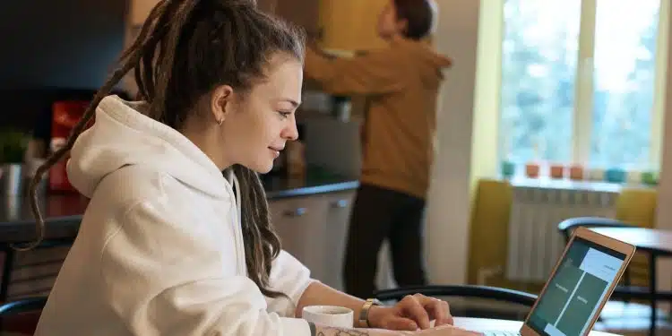 Shallow Focus Photo of Woman Using a Laptop